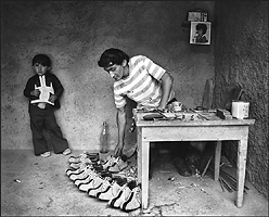Shoemaker and child
